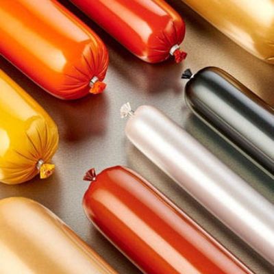 30-350 mm de ancho plano PVDC Película de carcasa de salchicha de plástico Resistente al calor hasta 90 ° C para el embalaje de salchichas